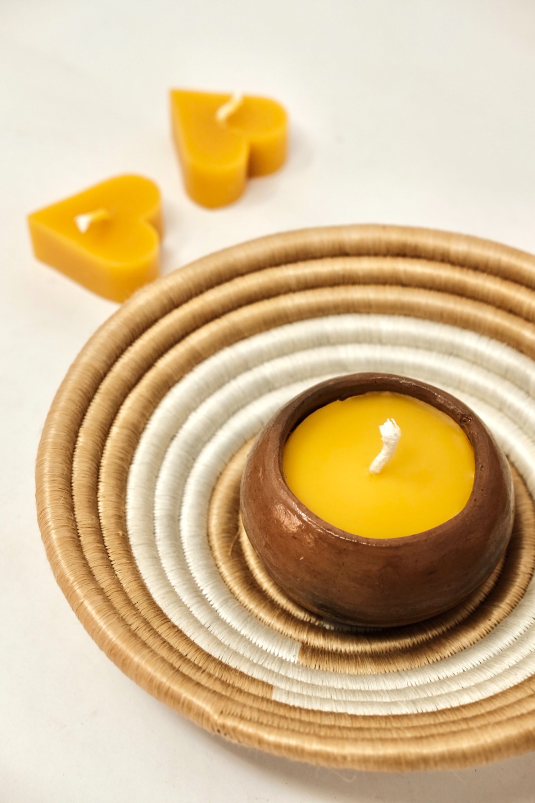 Pot candle in bowl with hearts